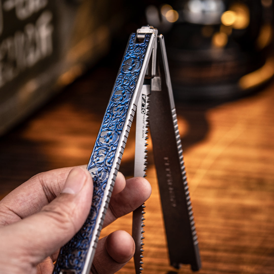 Skull Engraved Titanium Folding Saw