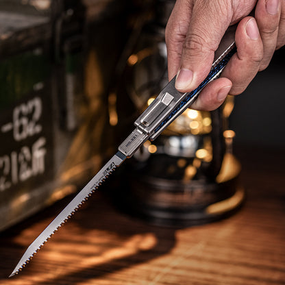 Skull Engraved Titanium Folding Saw