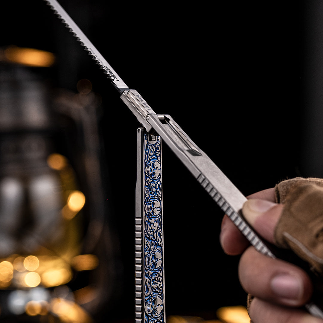 Skull Engraved Titanium Folding Saw